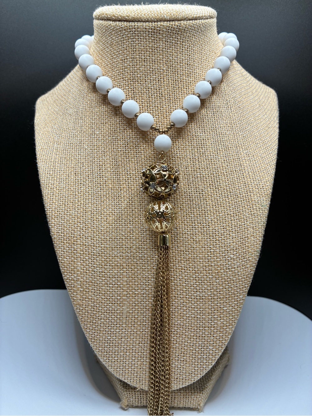 White And Gold Long Beaded Necklace with Gold Tassel Filigree Pendant